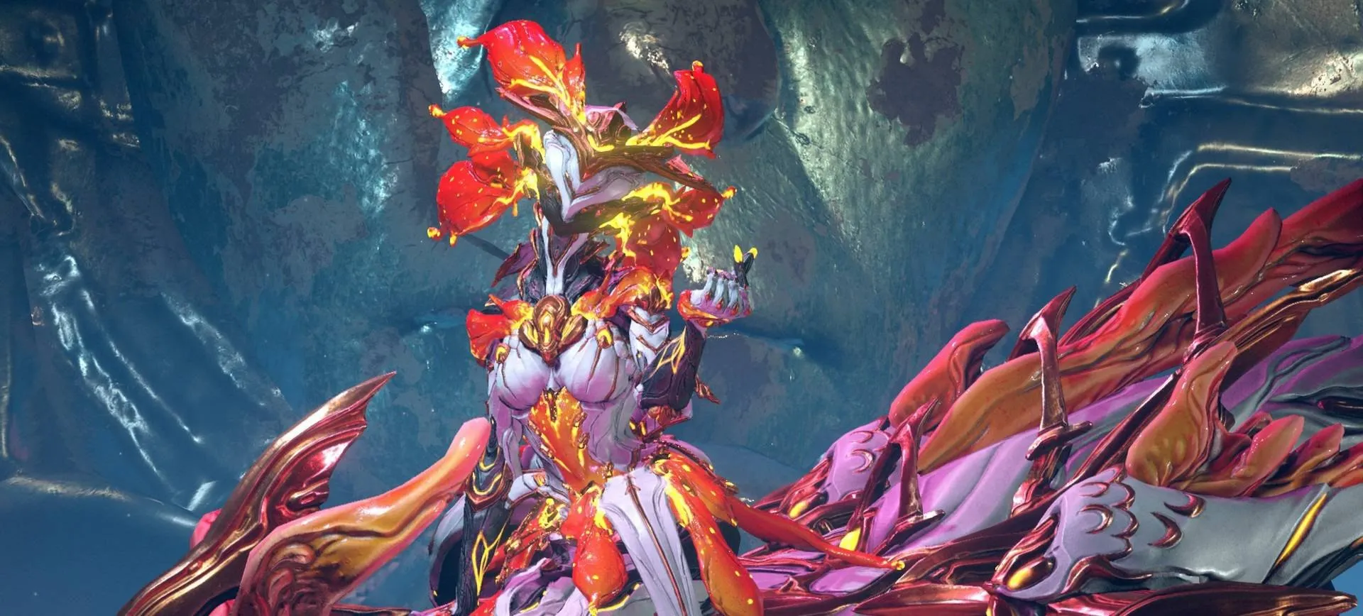 A red, orange, and white Warframe posed beside a matching companion.